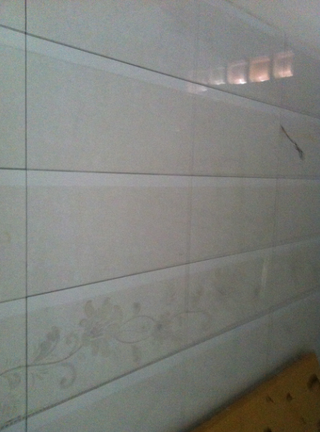 Ốp gạch tường vệ sinh - Sửa nhà Thầy Ngọc Bình Dương