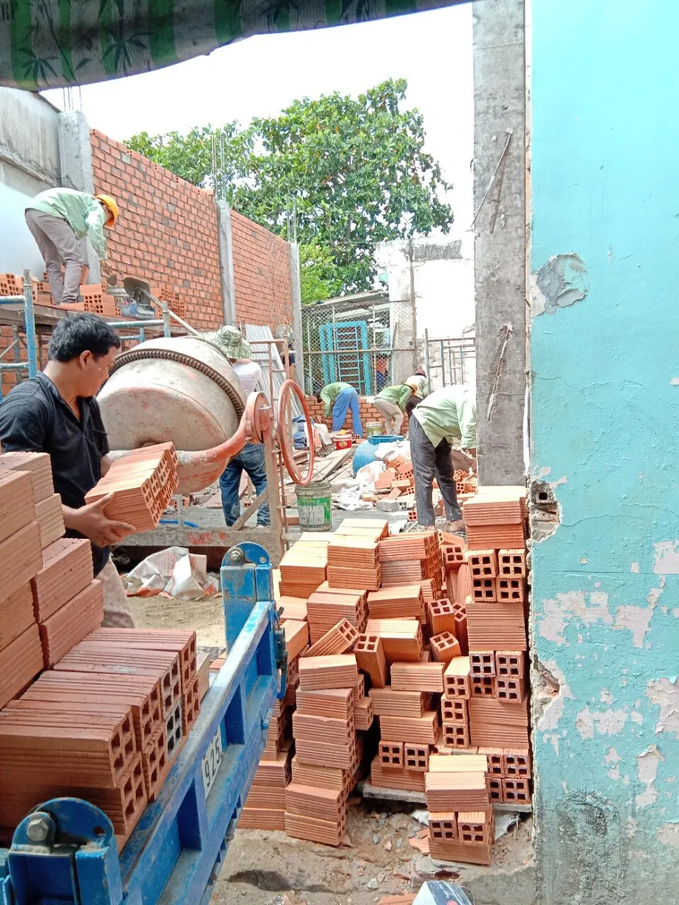 Qu&aacute; tr&igrave;nh thi c&ocirc;ng đổ cột s&agrave;n 1,&nbsp;x&acirc;y tường bao nh&agrave; phố Quận 11 - X&acirc;y Dựng Kim Anh